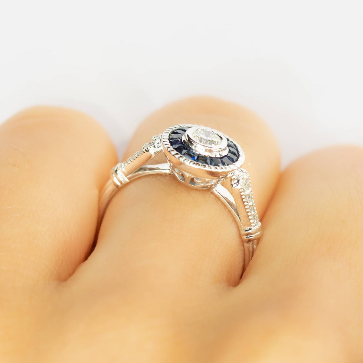 Diamond Ring with Sapphire Halo in 18K Gold
