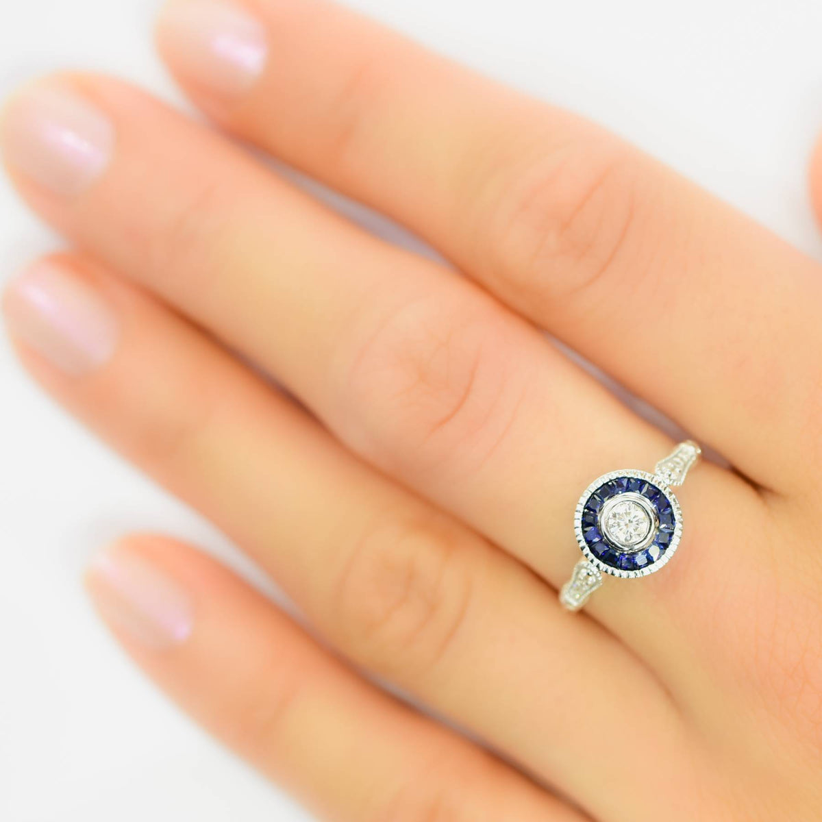 Diamond Ring with Sapphire Halo in 18K Gold