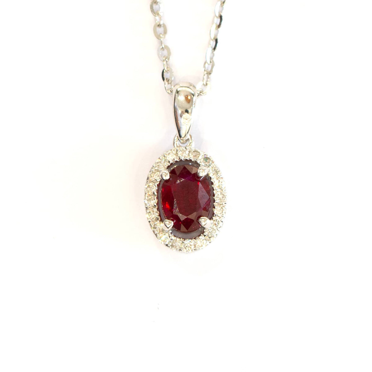 Natural Ruby and Diamond Halo Pendant in 18K Gold