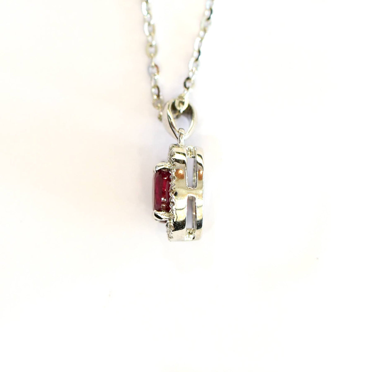 Natural Ruby and Diamond Halo Pendant in 18K Gold
