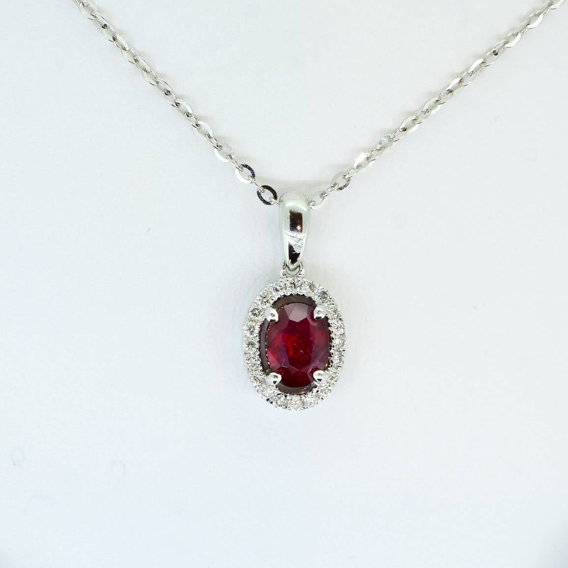 Natural Ruby and Diamond Halo Pendant in 18K Gold