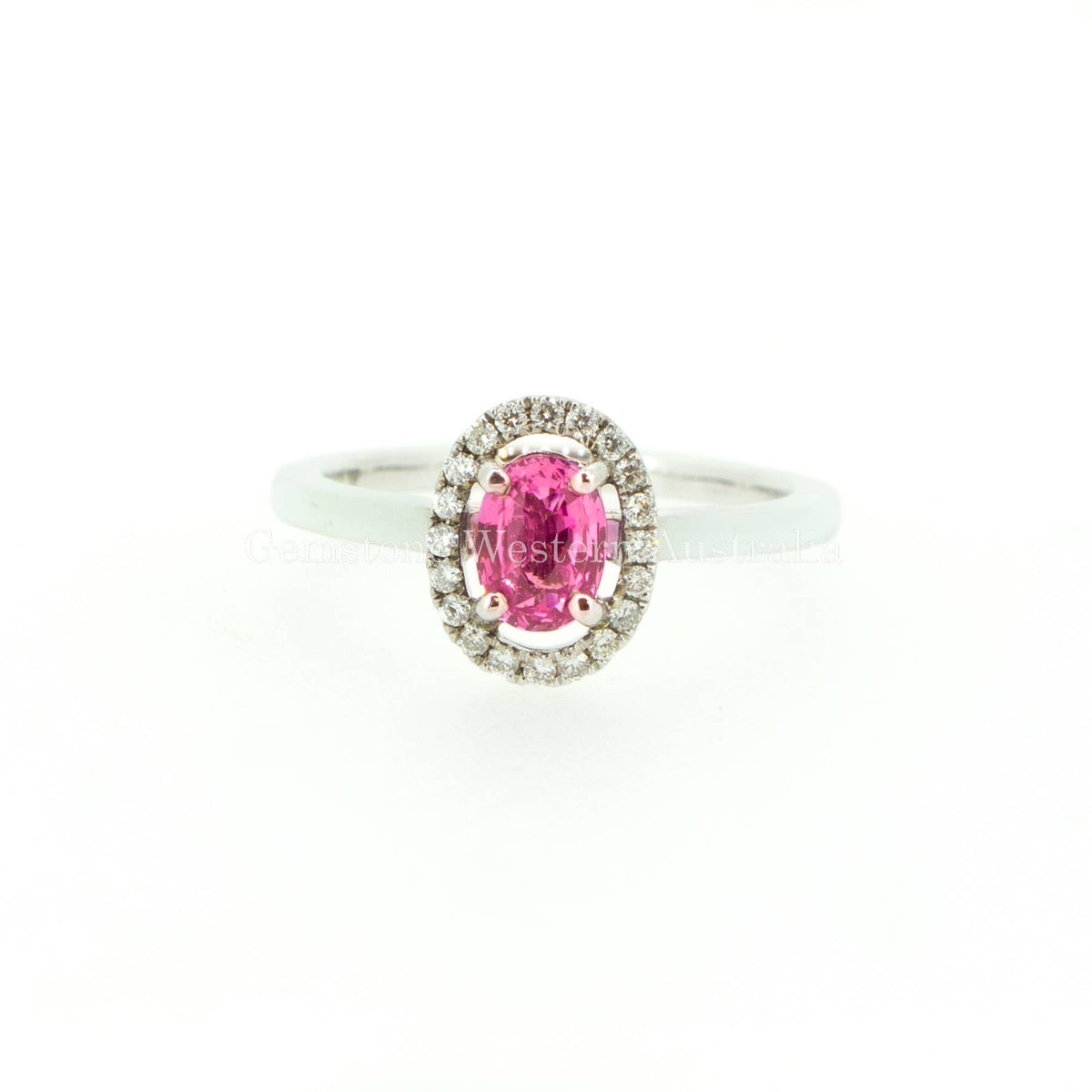 Natural Pink Sapphire and Diamond Halo Ring in 18K Gold