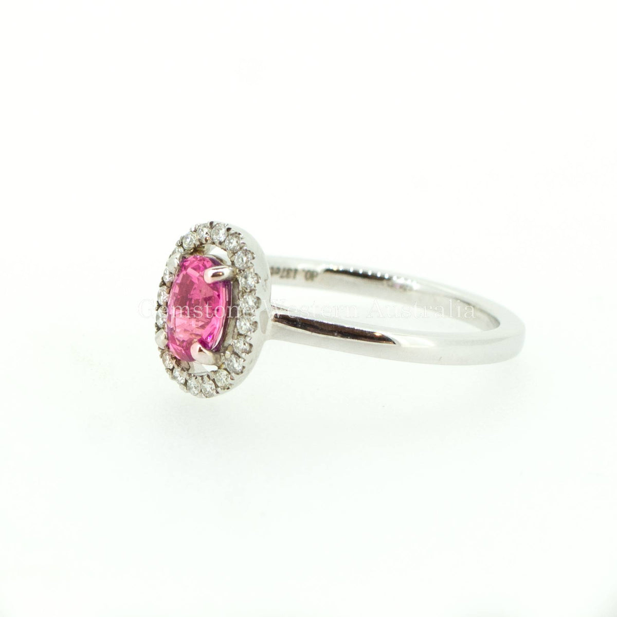 Natural Pink Sapphire and Diamond Halo Ring in 18K Gold