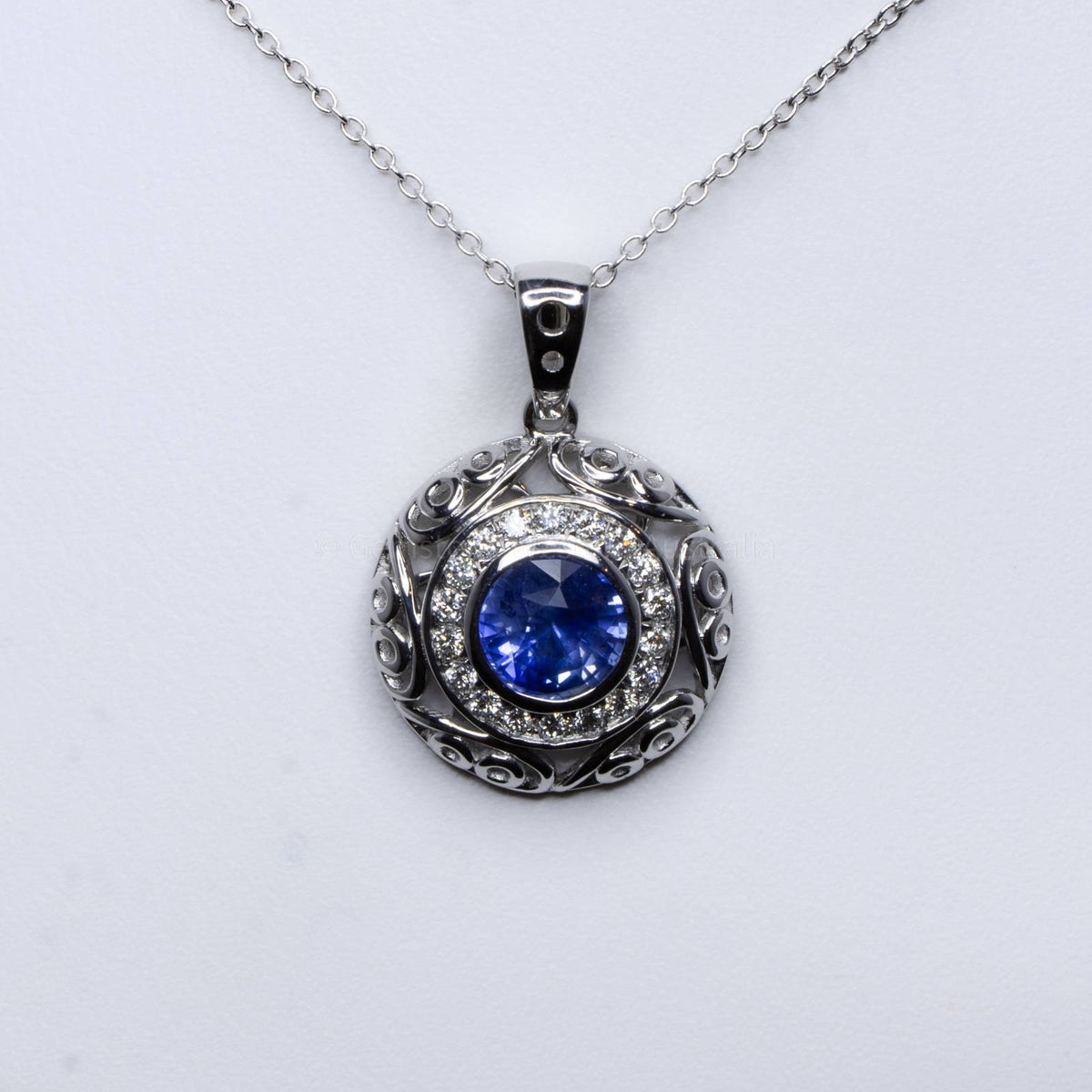 Natural Unheated Blue Sapphire and Diamond Pendant in 18K White Gold