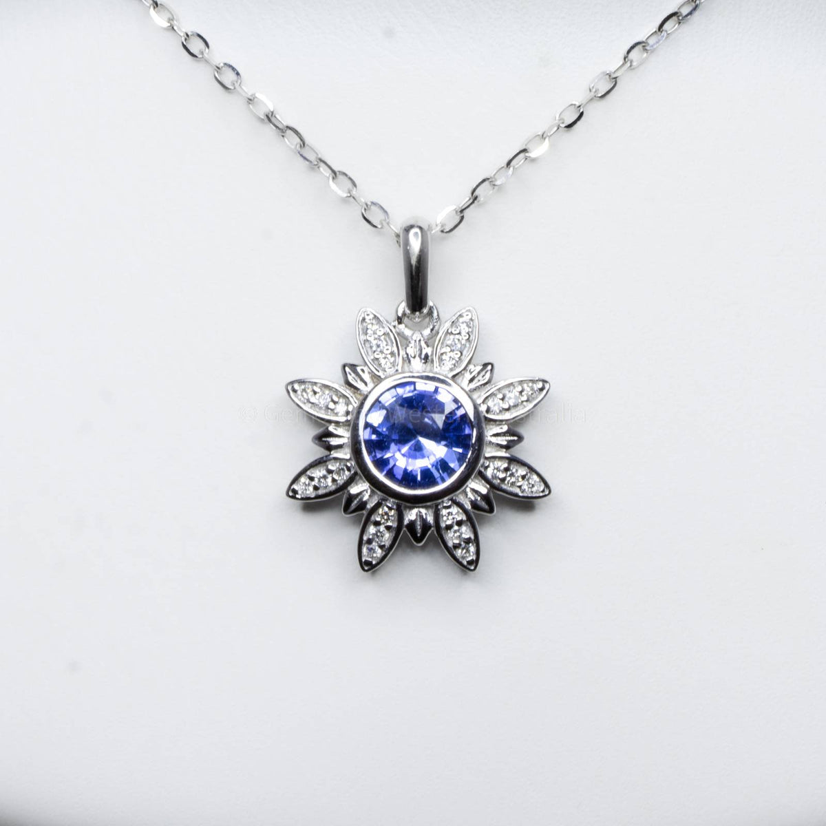 Cornflower Blue Sapphire and Diamonds Flower Pendant in 18K White Gold