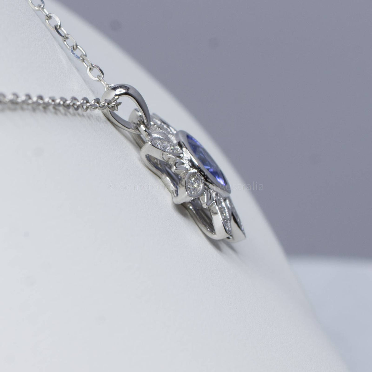 Cornflower Blue Sapphire and Diamonds Flower Pendant in 18K White Gold