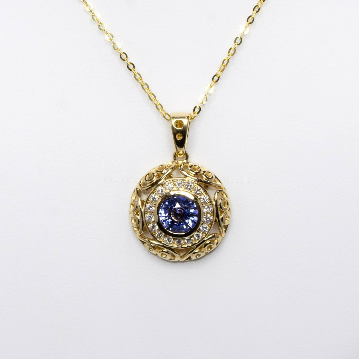 Natural Unheated Blue Sapphire and Diamond Pendant in 18K Yellow Gold