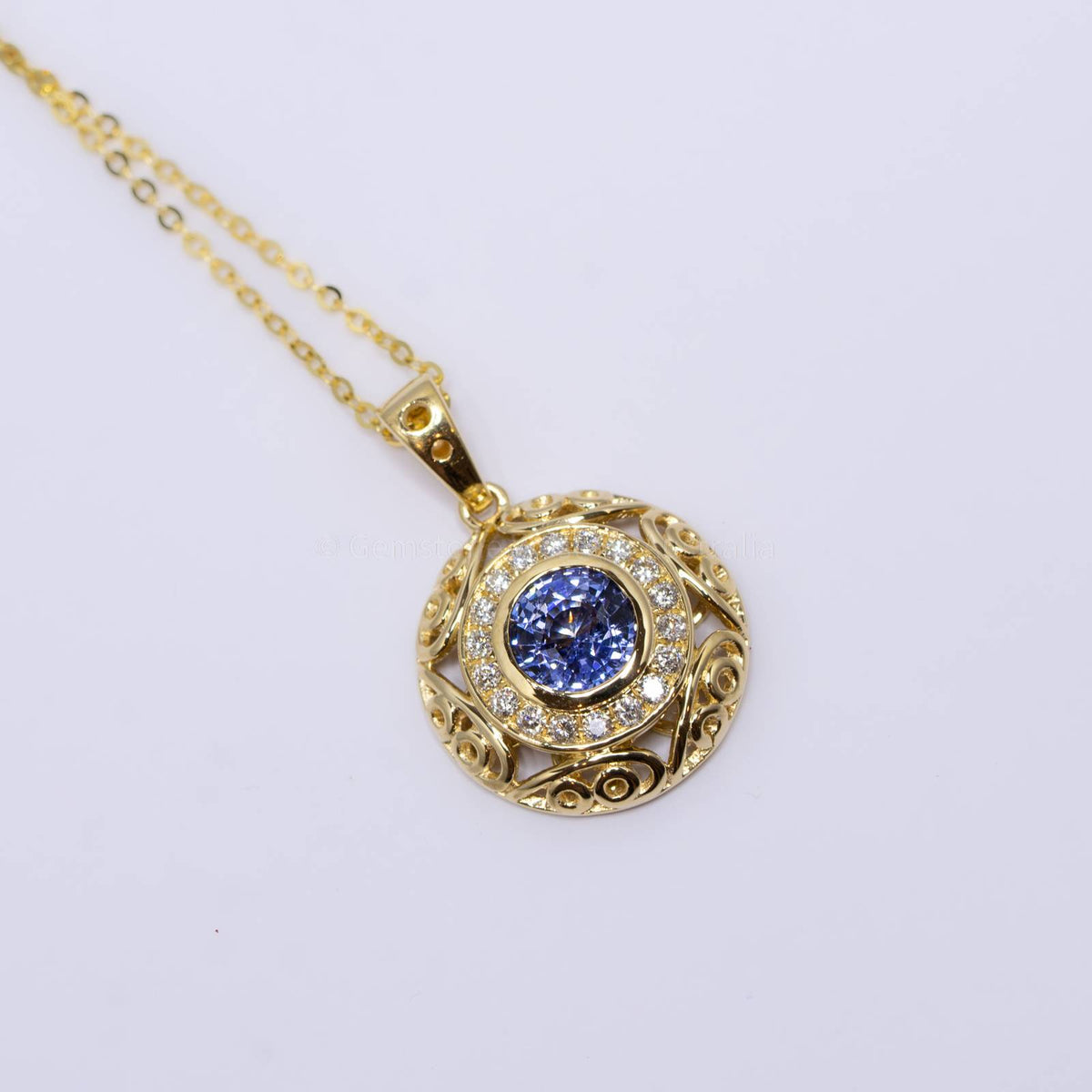 Natural Unheated Blue Sapphire and Diamond Pendant in 18K Yellow Gold