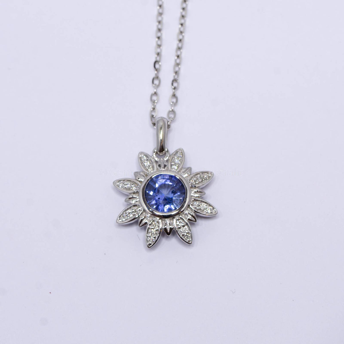 Cornflower Blue Sapphire and Diamonds Flower Pendant in 18K White Gold