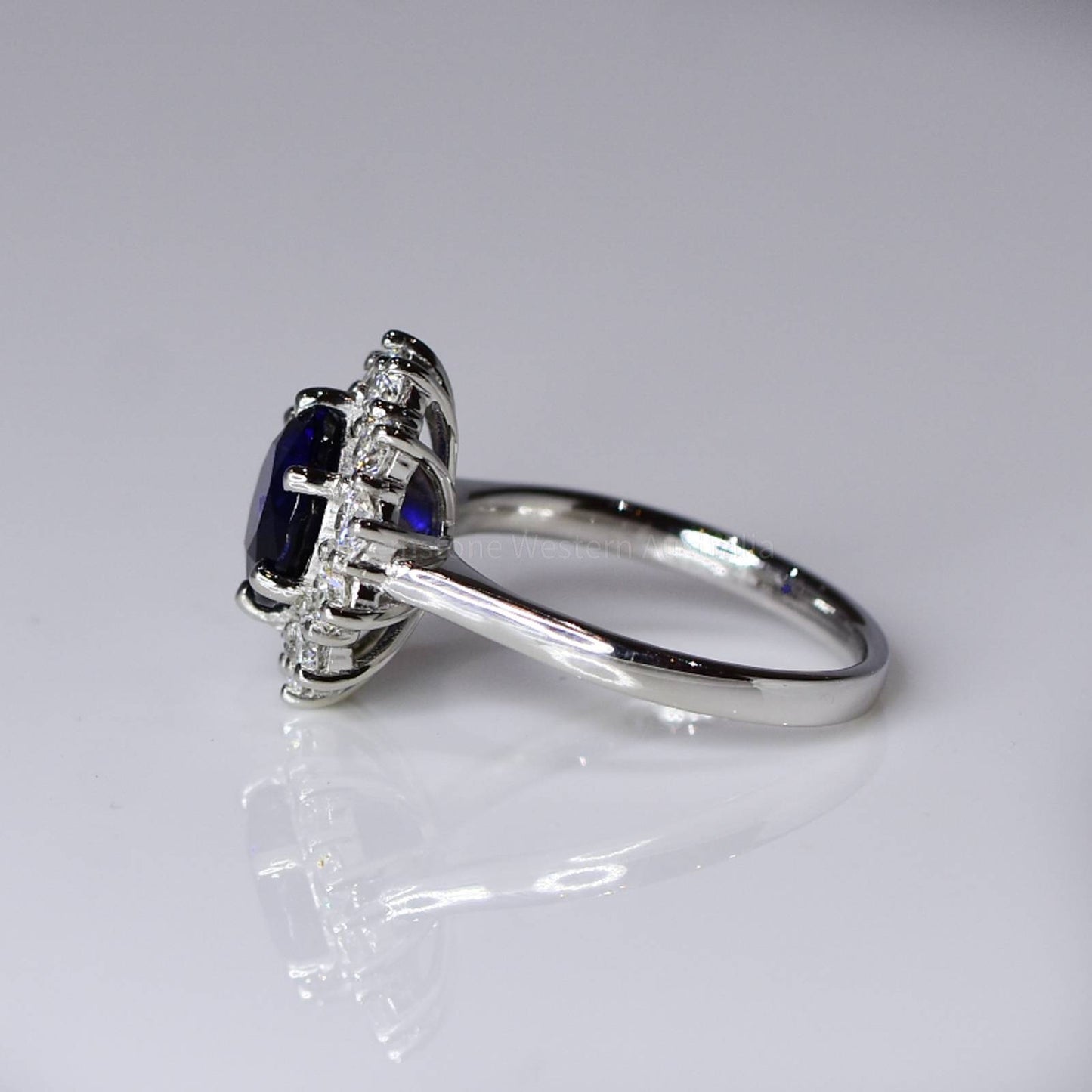 3.16ct Royal Blue Sapphire Diamond Halo Ring in Platinum