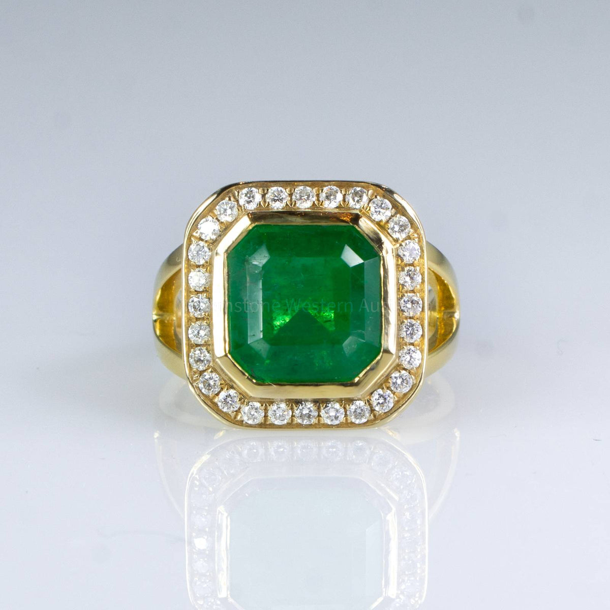 4.82ct Colombian Emerald Statement Ring with Diamond Halo in 18K Gold