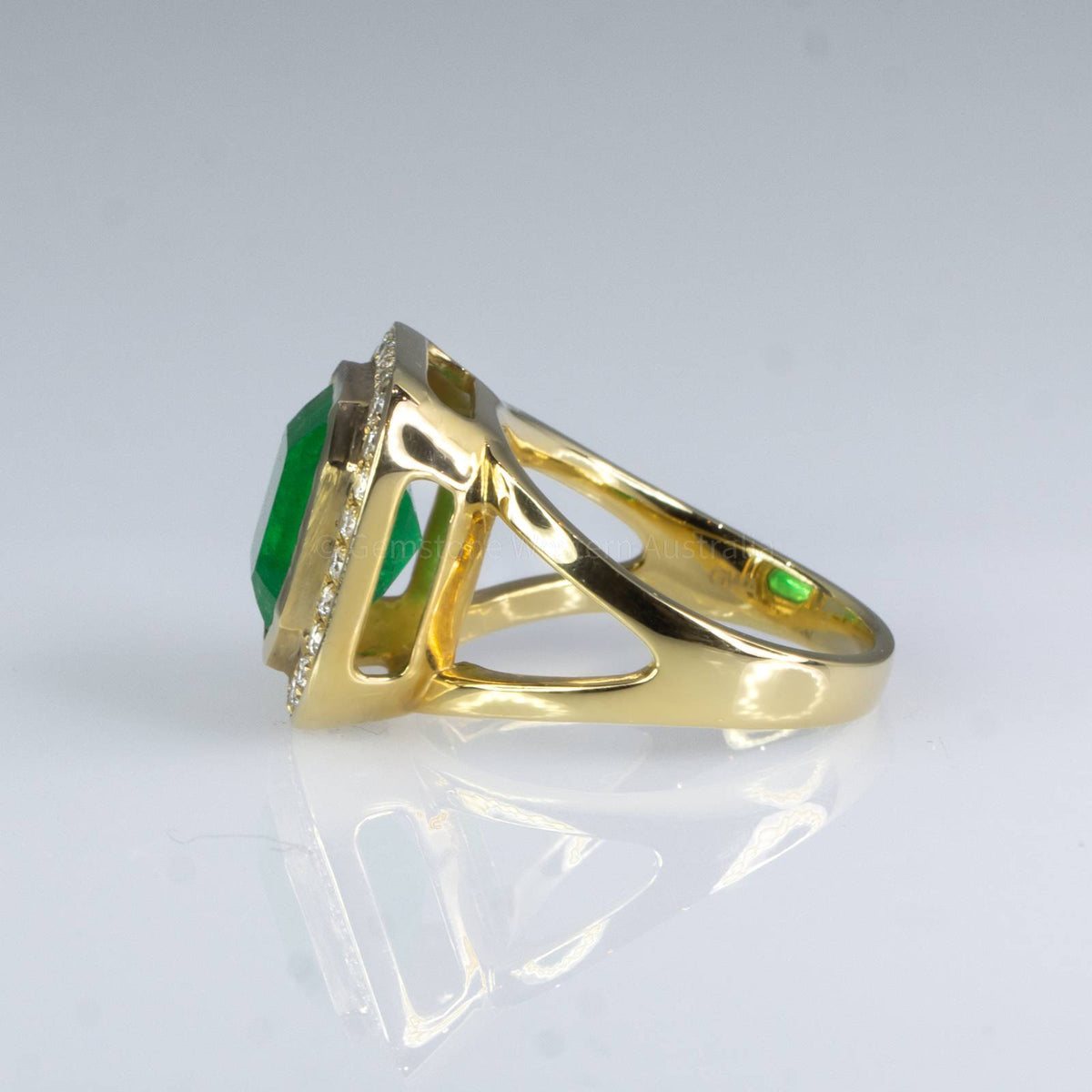 4.82ct Colombian Emerald Statement Ring with Diamond Halo in 18K Gold