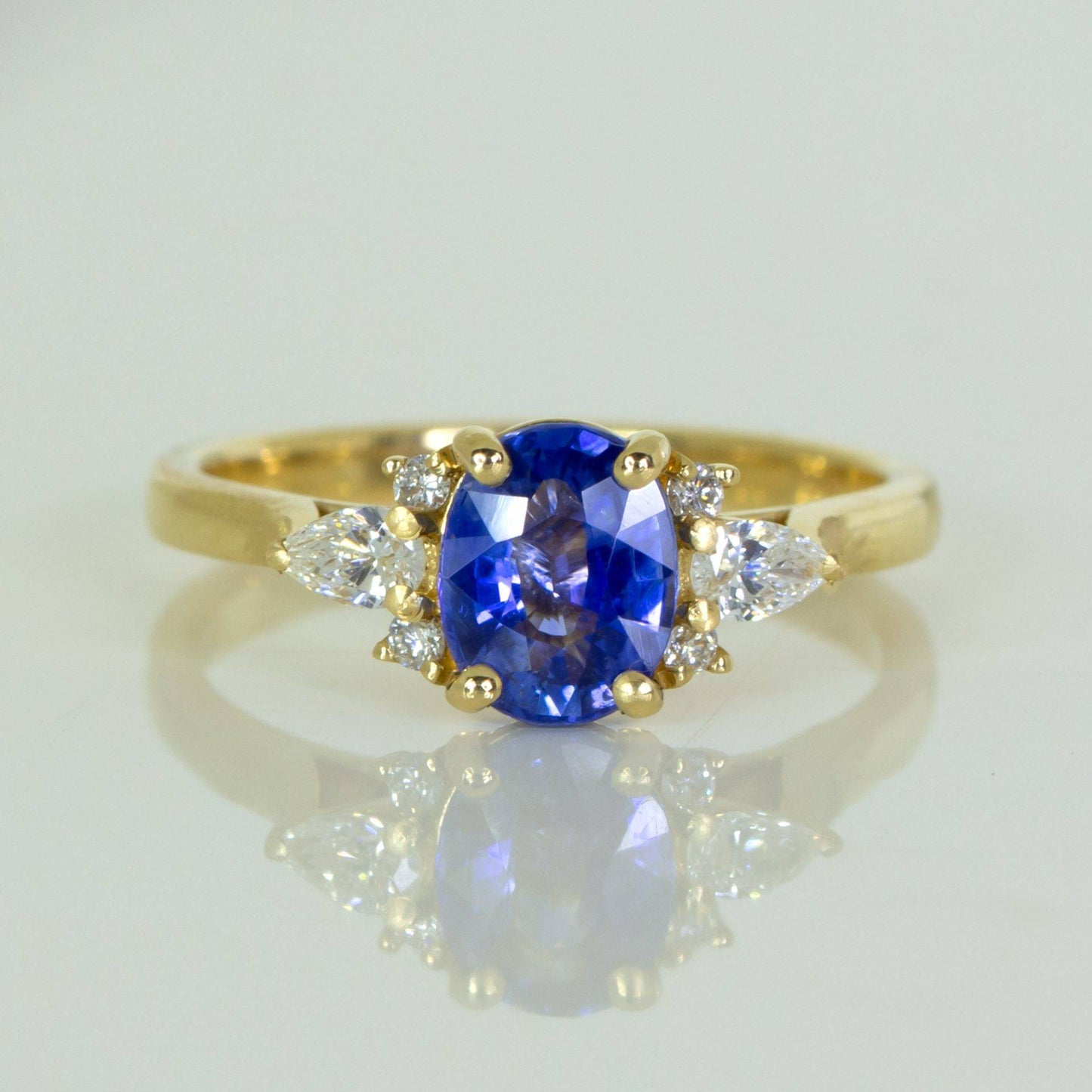 Contemporary Sapphire Ring with Diamonds in 18K Gold