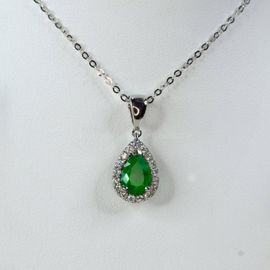 Pear Shape Colombian emerald halo pendant
