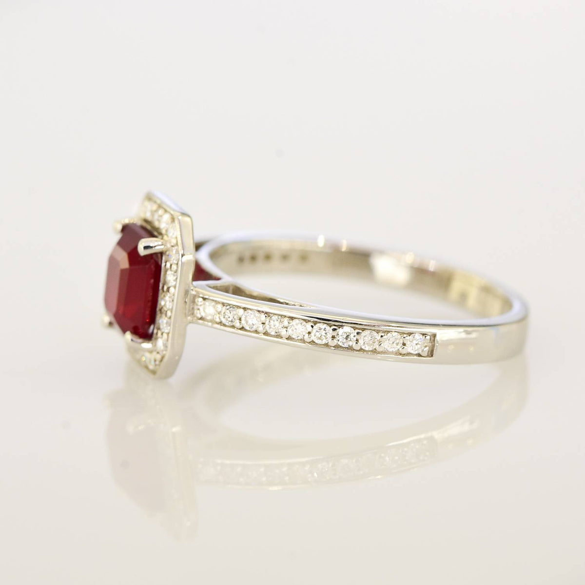 1.55ct Ruby and Diamond Halo Engagement Ring