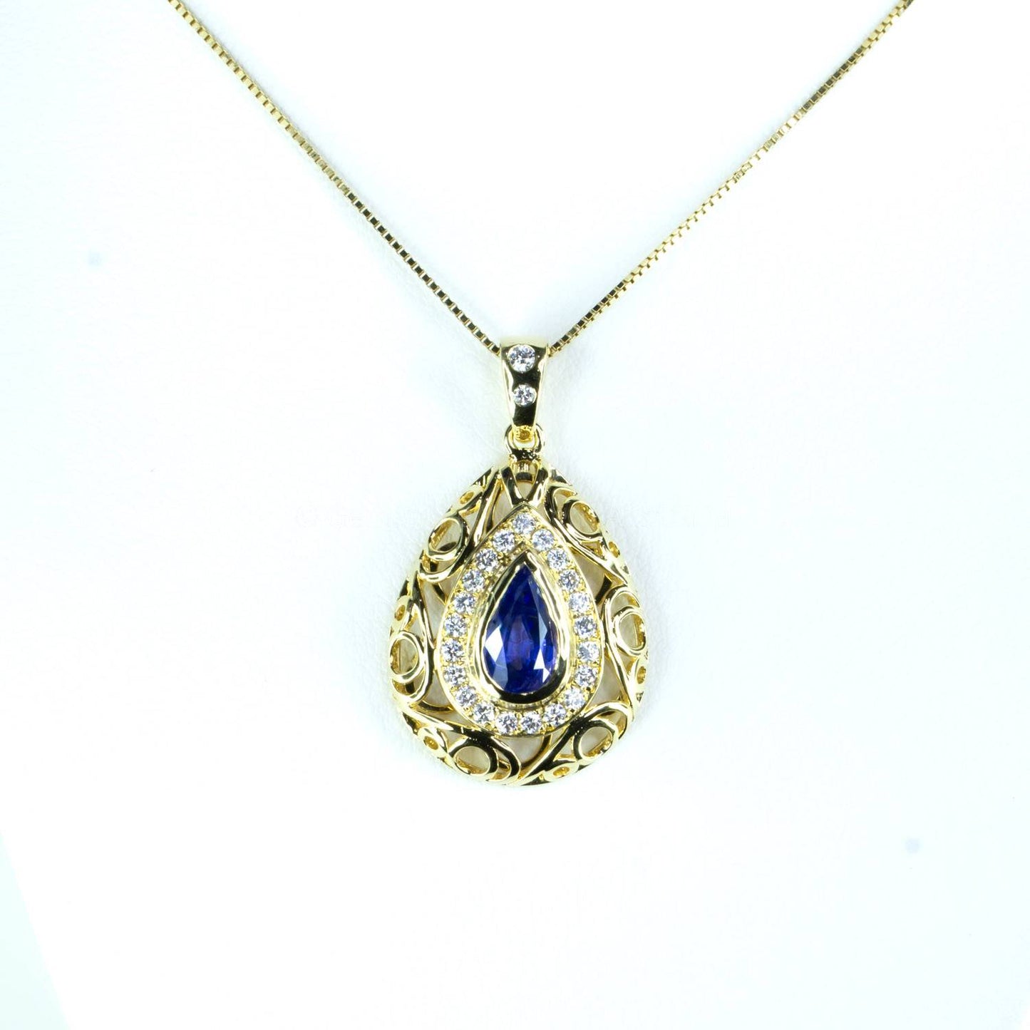 1.25ct Natural Blue Sapphire Pendant with Diamond Halo Design