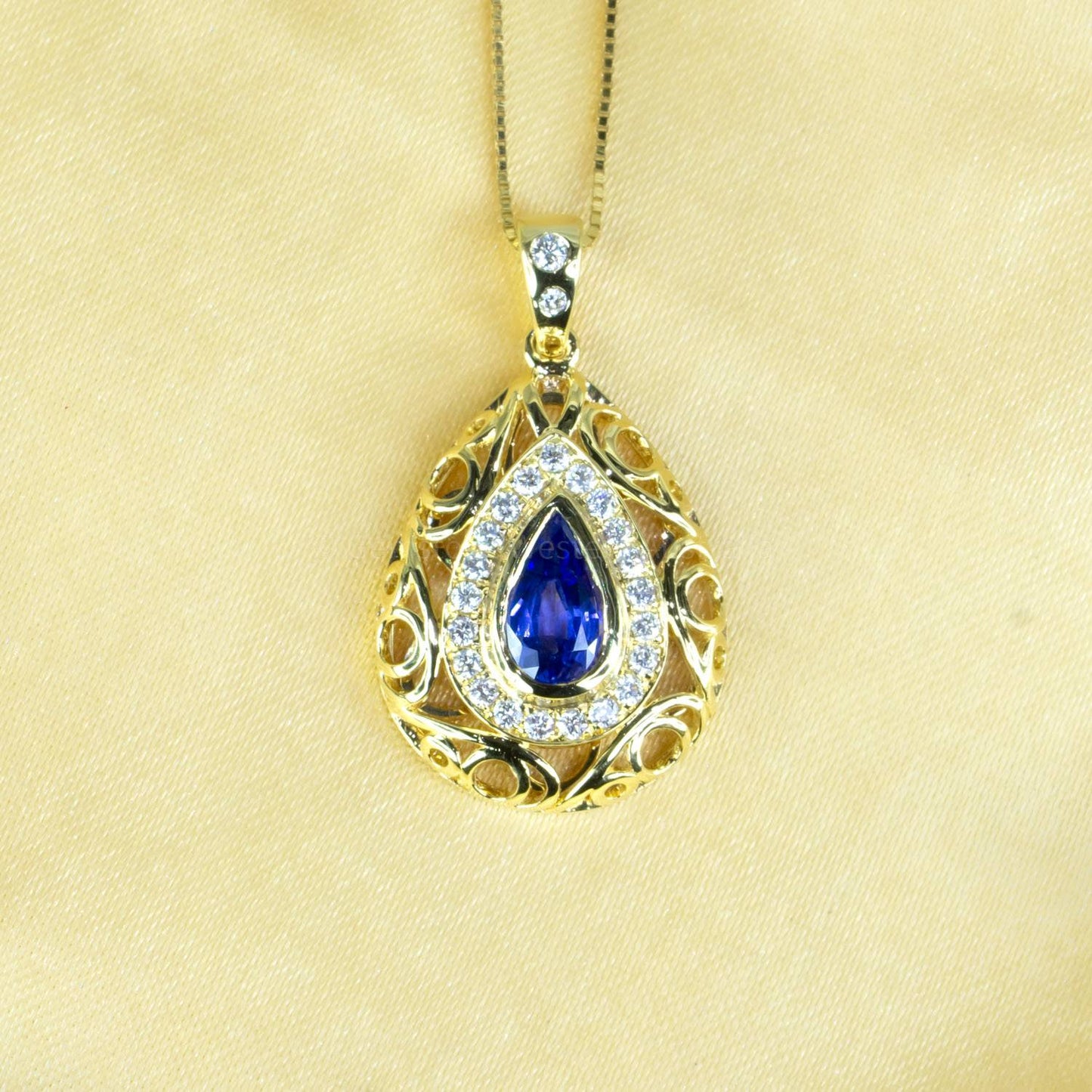 1.25ct Natural Blue Sapphire Pendant with Diamond Halo Design