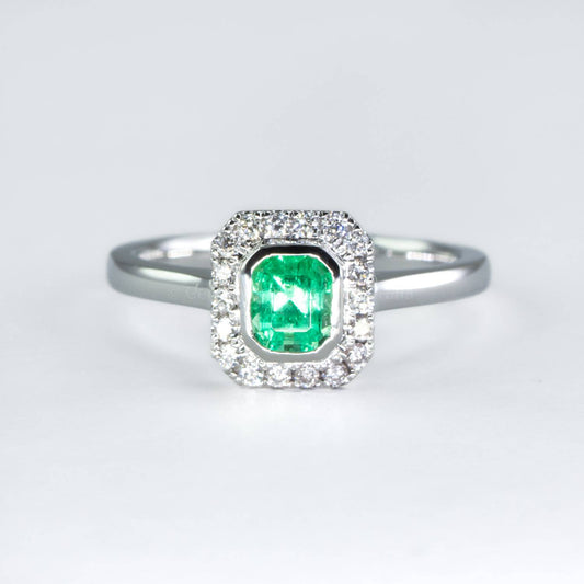 Platinum Emerald Ring with Diamond Halo