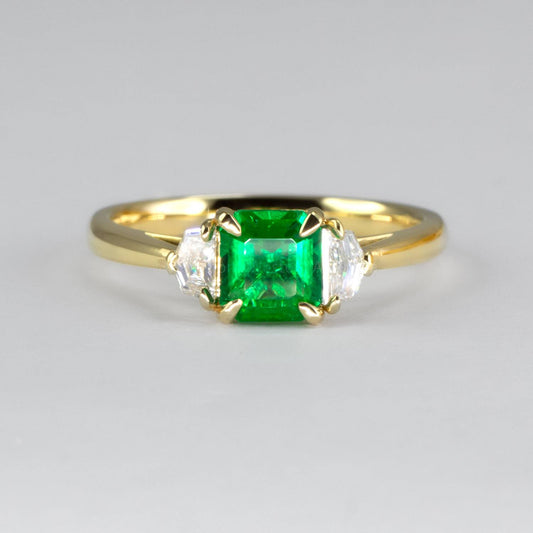 Emerald Cut Emerald and Cadillac Diamonds Three Stone Ring