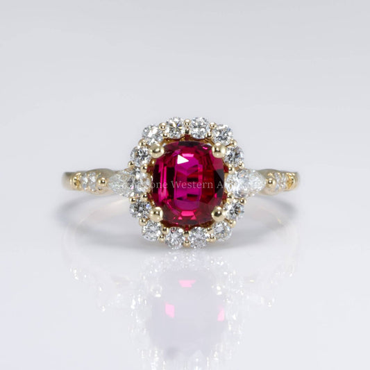 Natural Ruby Ring with Pear-Shaped Diamonds and Halo of Round Diamonds in 18K Yellow Gold | Natural Gemstone Jewellery