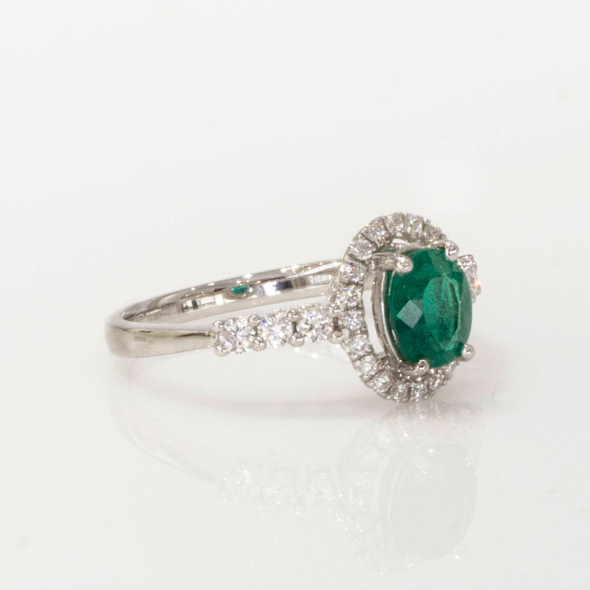 Fine Quality Colombian Emerald Halo Ring in 18K Gold
