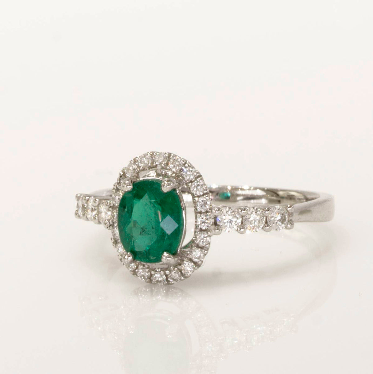 Fine Quality Colombian Emerald Halo Ring in 18K Gold