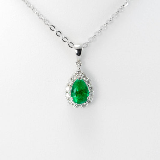 Natural Colombian Emerald and Diamond Halo Pendant in Platinum