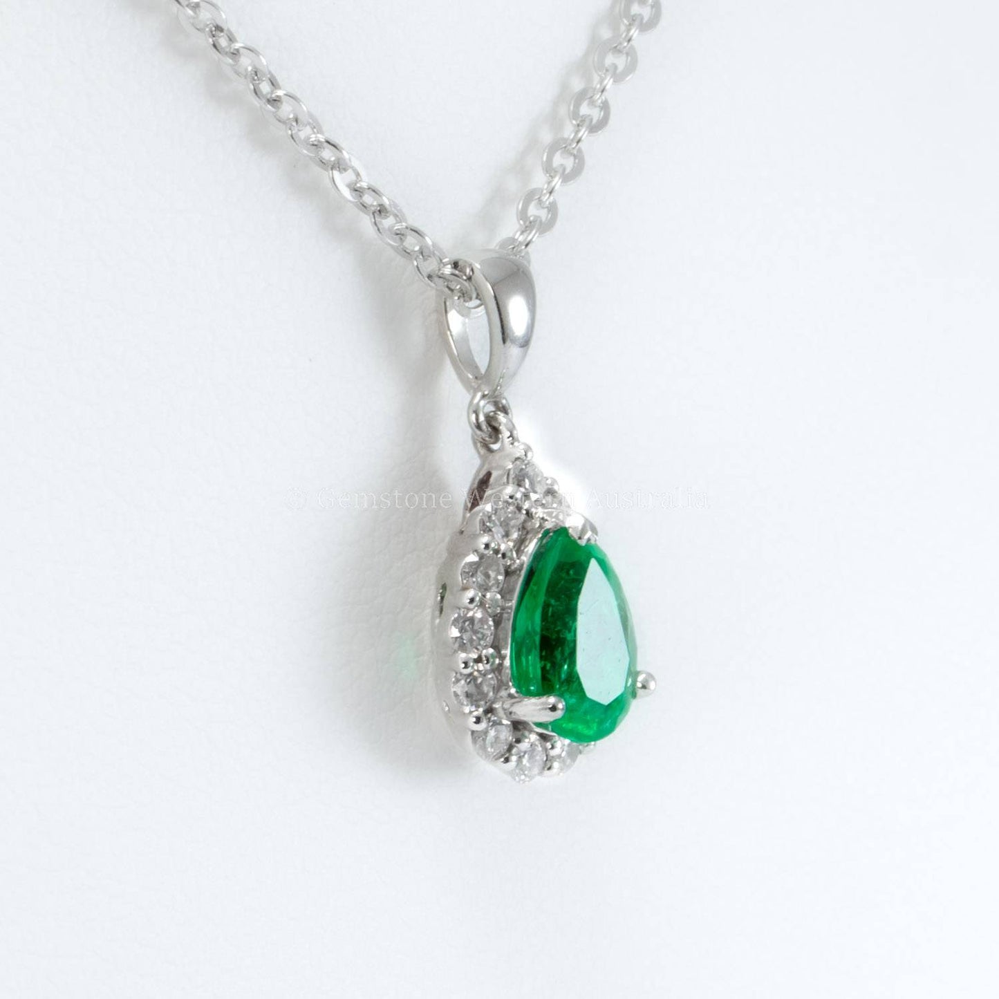 Natural Colombian Emerald and Diamond Halo Pendant in Platinum