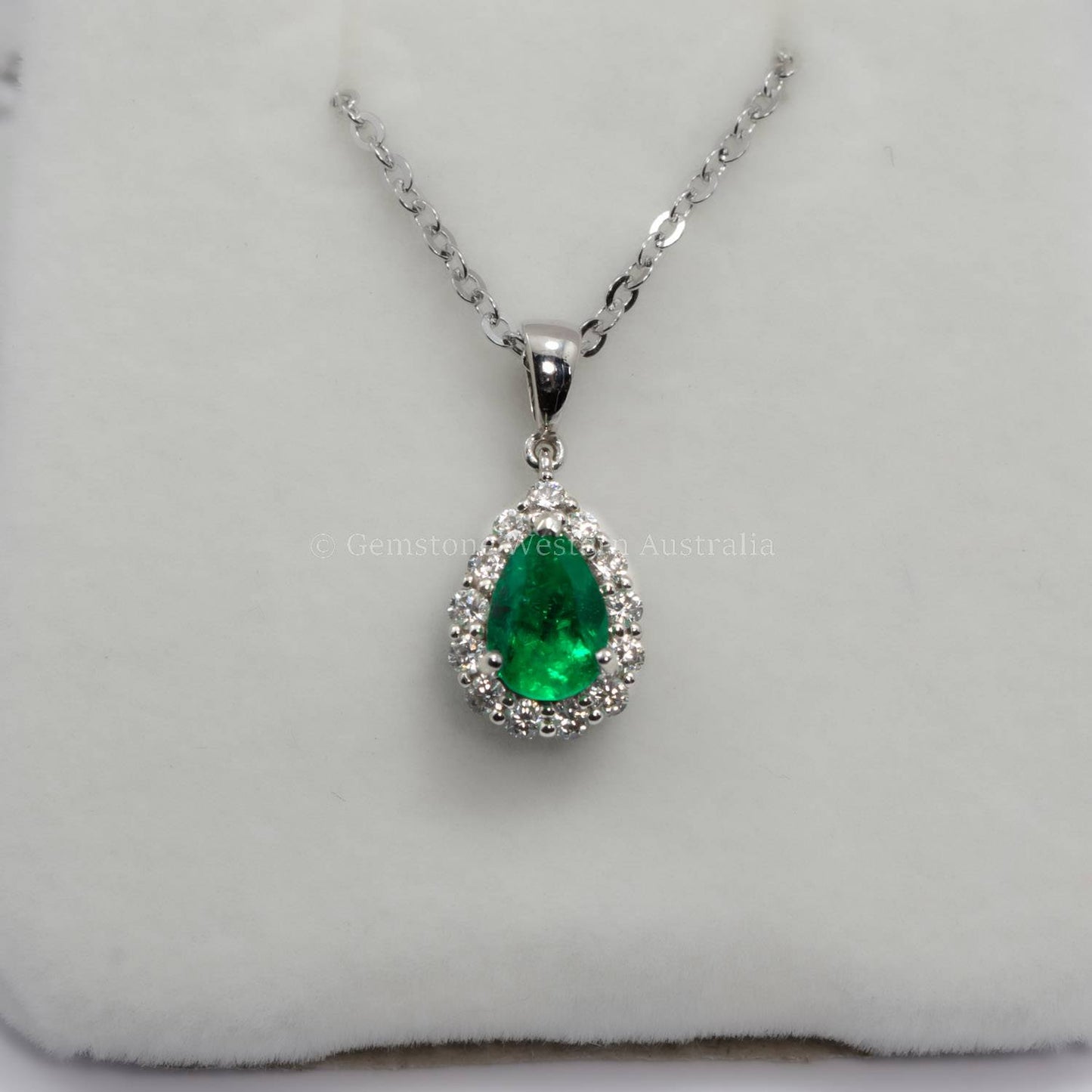 Natural Colombian Emerald and Diamond Halo Pendant in Platinum