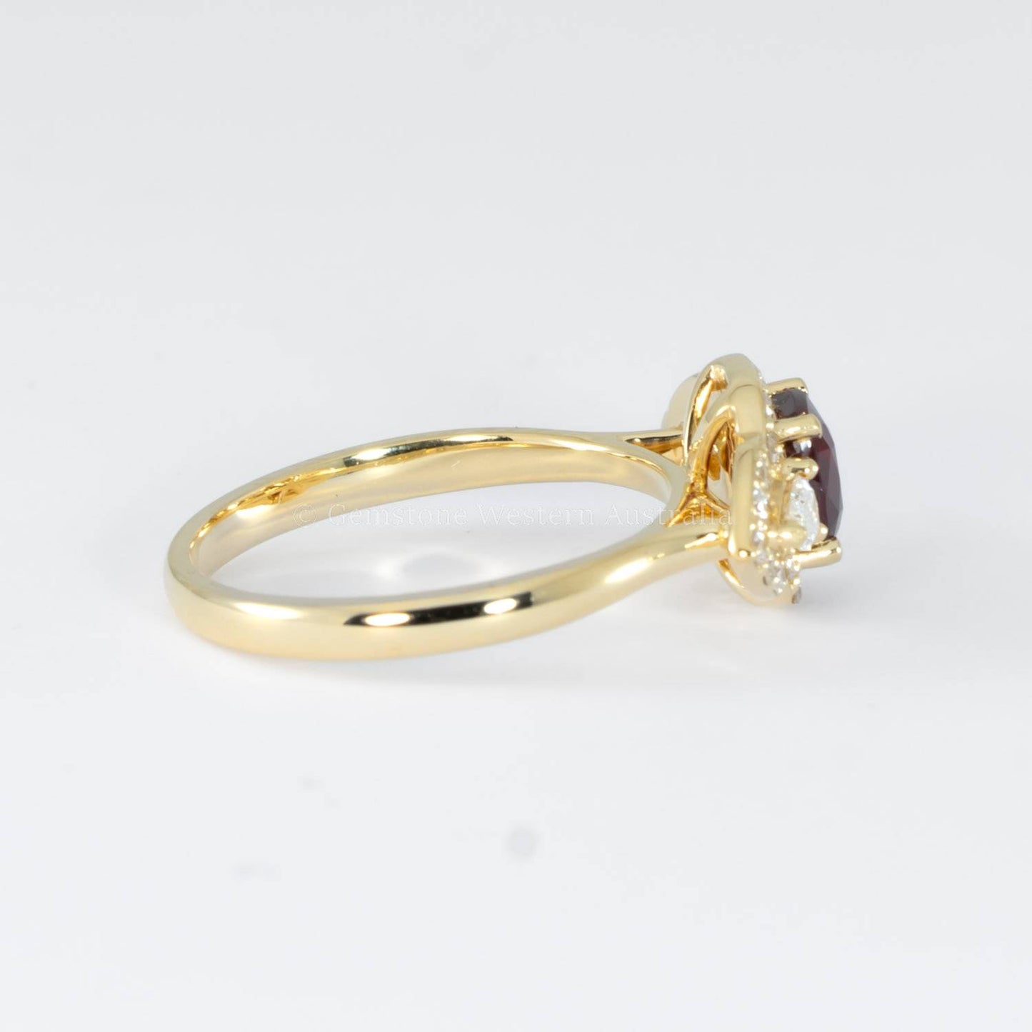 1 Carat Cushion Cut Ruby and Diamond Halo Ring in 18K Yellow Gold
