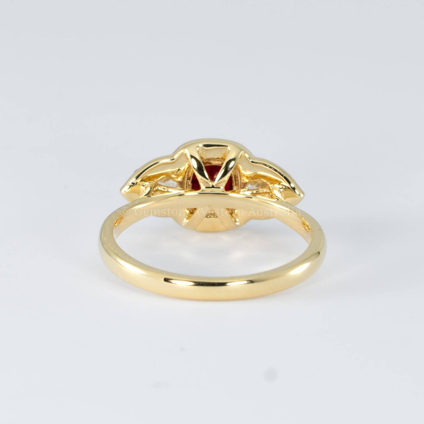 1 Carat Cushion Cut Ruby and Diamond Halo Ring in 18K Yellow Gold