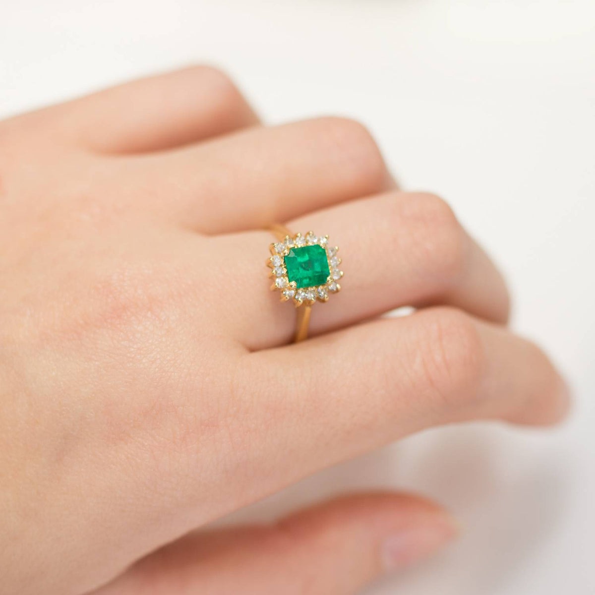 Colombian Emerald and Diamond Halo Ring Emerald Cut 18k Gold