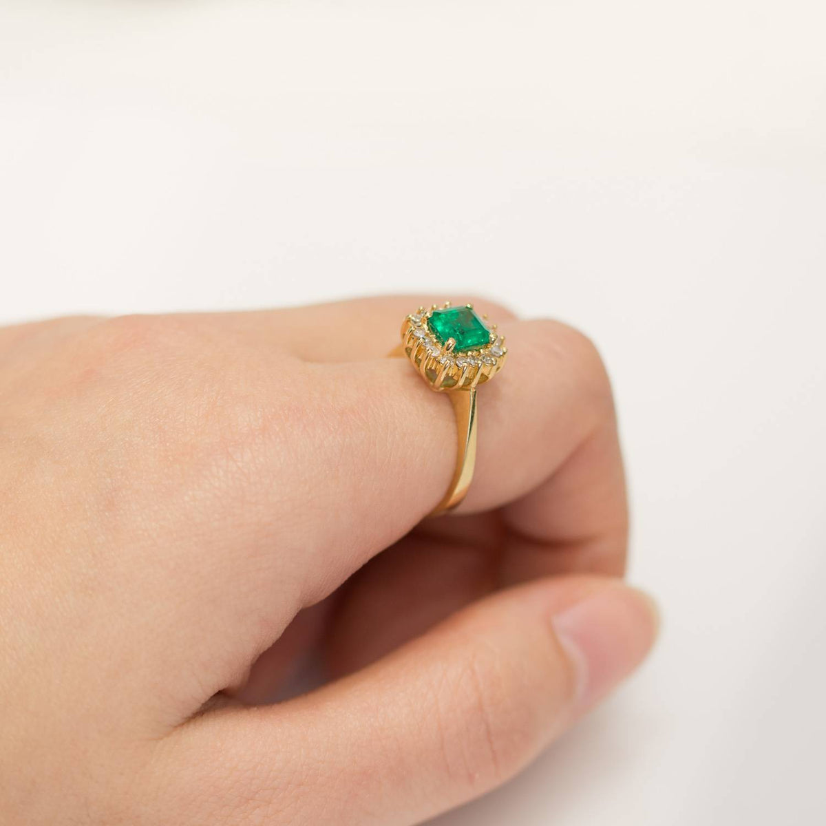 Colombian Emerald and Diamond Halo Ring Emerald Cut 18k Gold