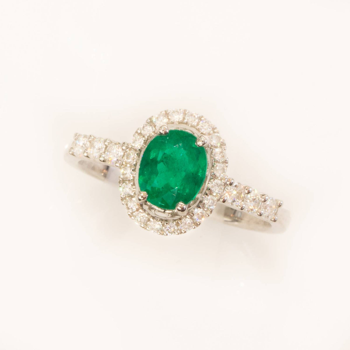 Fine Quality Colombian Emerald Halo Ring in 18K Gold
