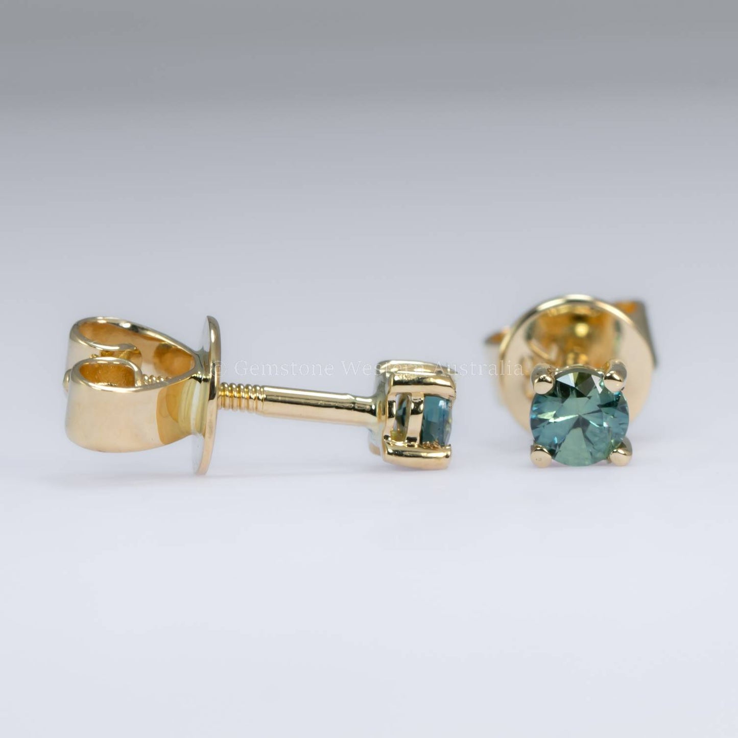 Classic 4-Prong Australian Teal Sapphire Stud Earrings in 18K Gold