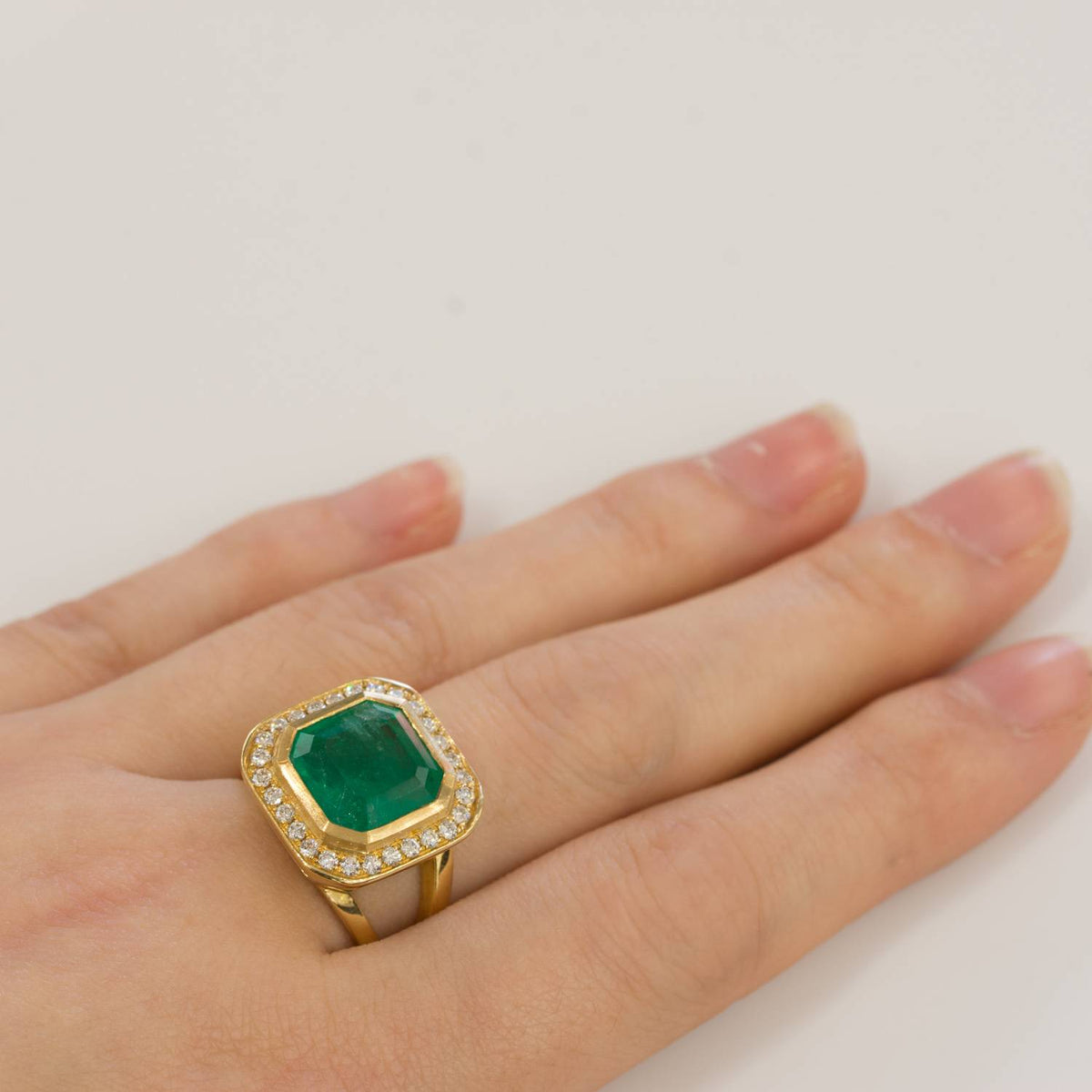 4.82ct Colombian Emerald Statement Ring with Diamond Halo in 18K Gold
