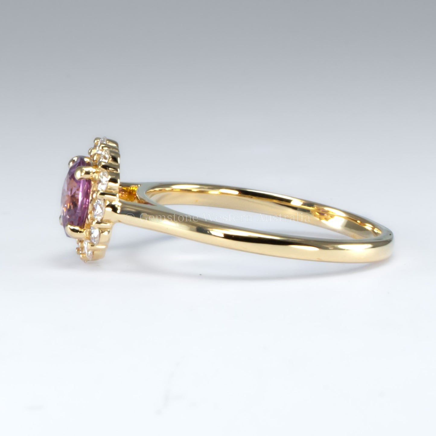 Unheated Round Pink Sapphire Halo Ring in 18K Yellow Gold