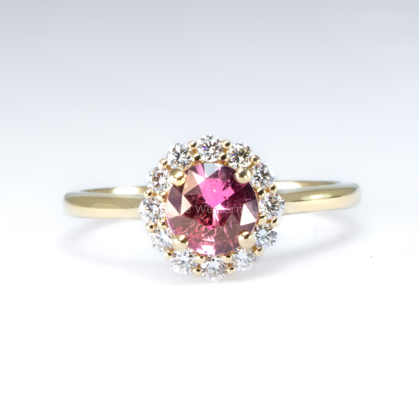 Unheated Round Pink Sapphire Halo Ring in 18K Yellow Gold