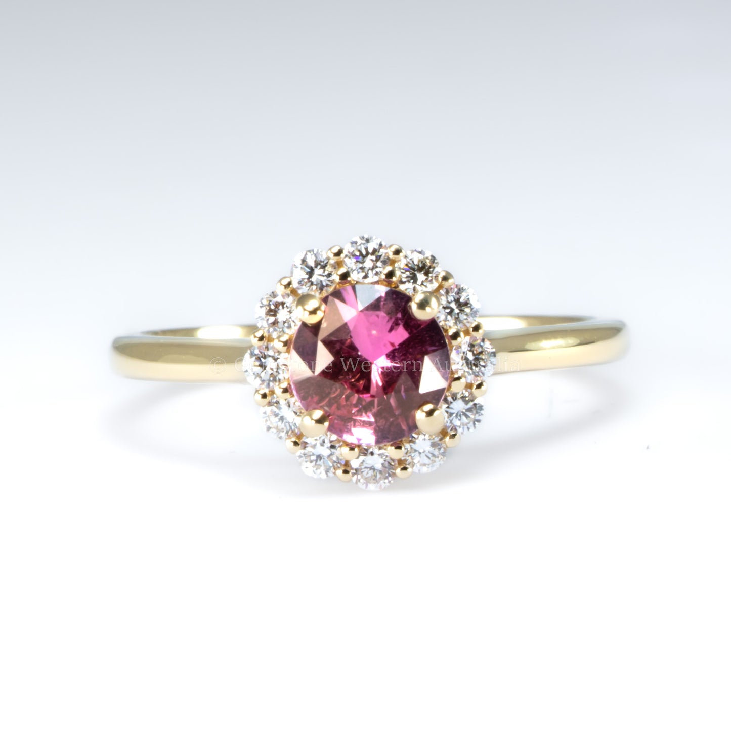 Unheated Round Pink Sapphire Halo Ring in 18K Yellow Gold