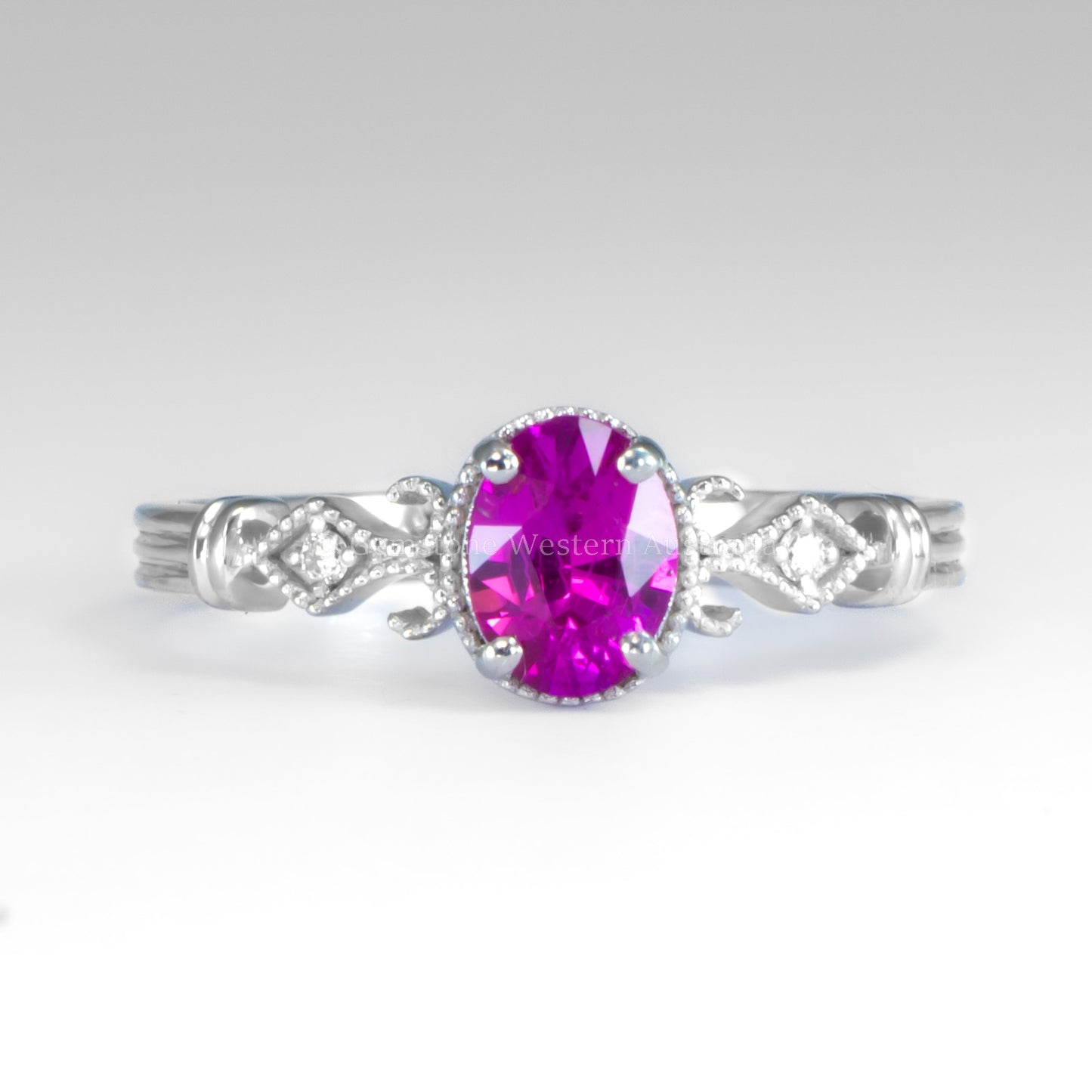 Oval Cut Pink Sapphire and Diamond Ring in Platinum 950 with Filigree Detail