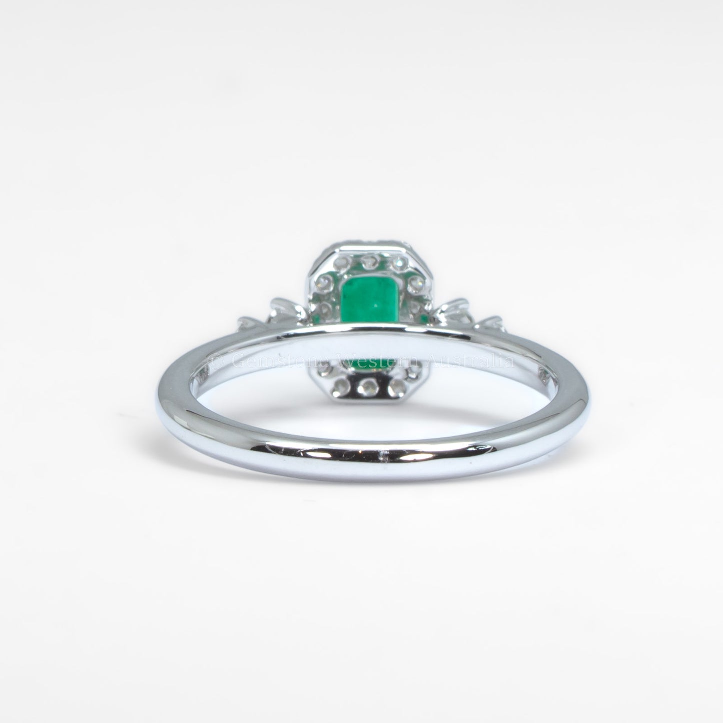 Colombian Emerald Halo Ring in Platinum with Compass-Set Diamonds