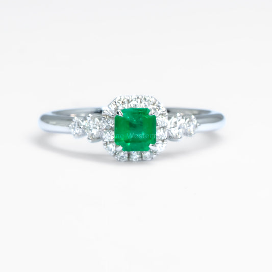 Platinum Ring with Emerald Cut Colombian Emerald and Diamond Halo