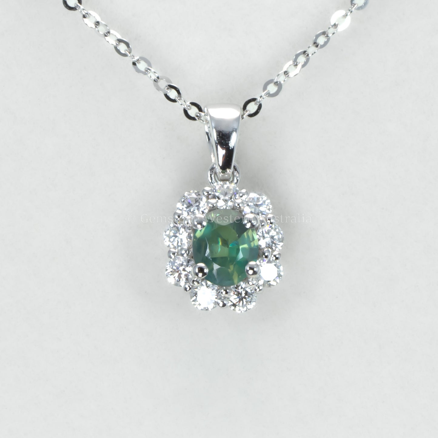 Oval Alexandrite Pendant with Diamond Halo in Platinum