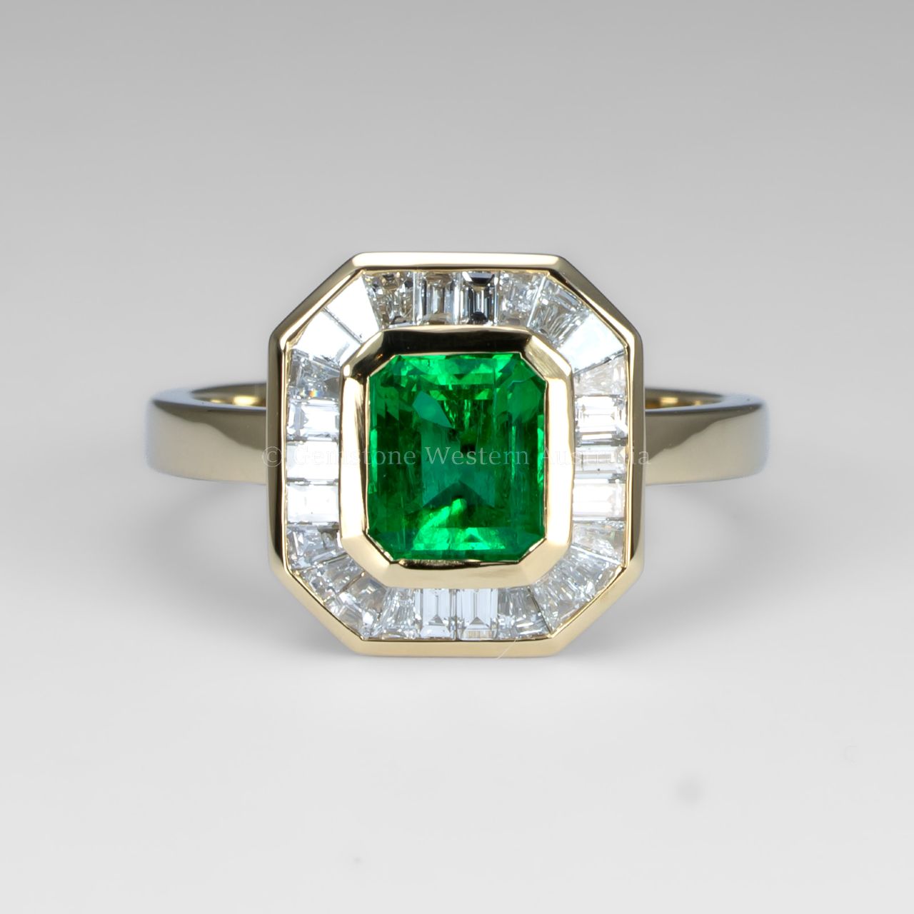Emerald Cut Colombian Emerald Ring with Baguette Diamond Halo in 18K Yellow Gold