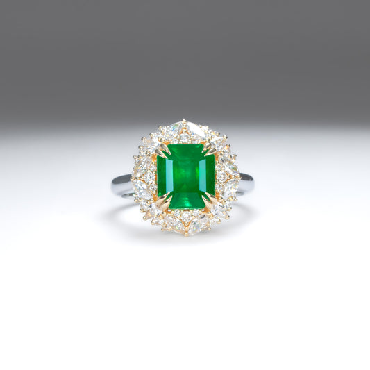 Emerald Statement Ring with Diamond Halo in 18K Gold and Platinum