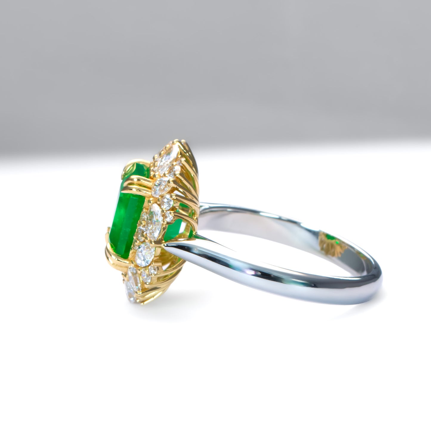 Emerald Statement Ring with Diamond Halo in 18K Gold and Platinum