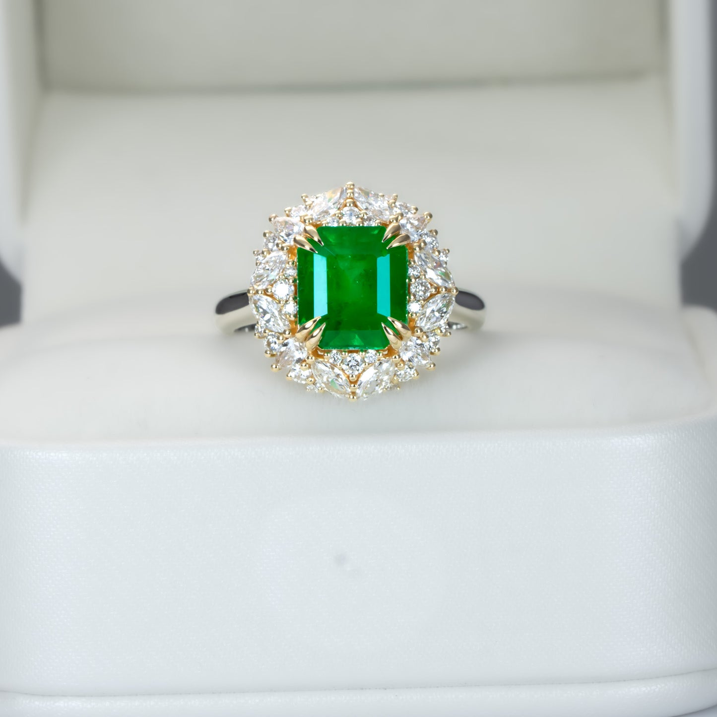 Emerald Statement Ring with Diamond Halo in 18K Gold and Platinum