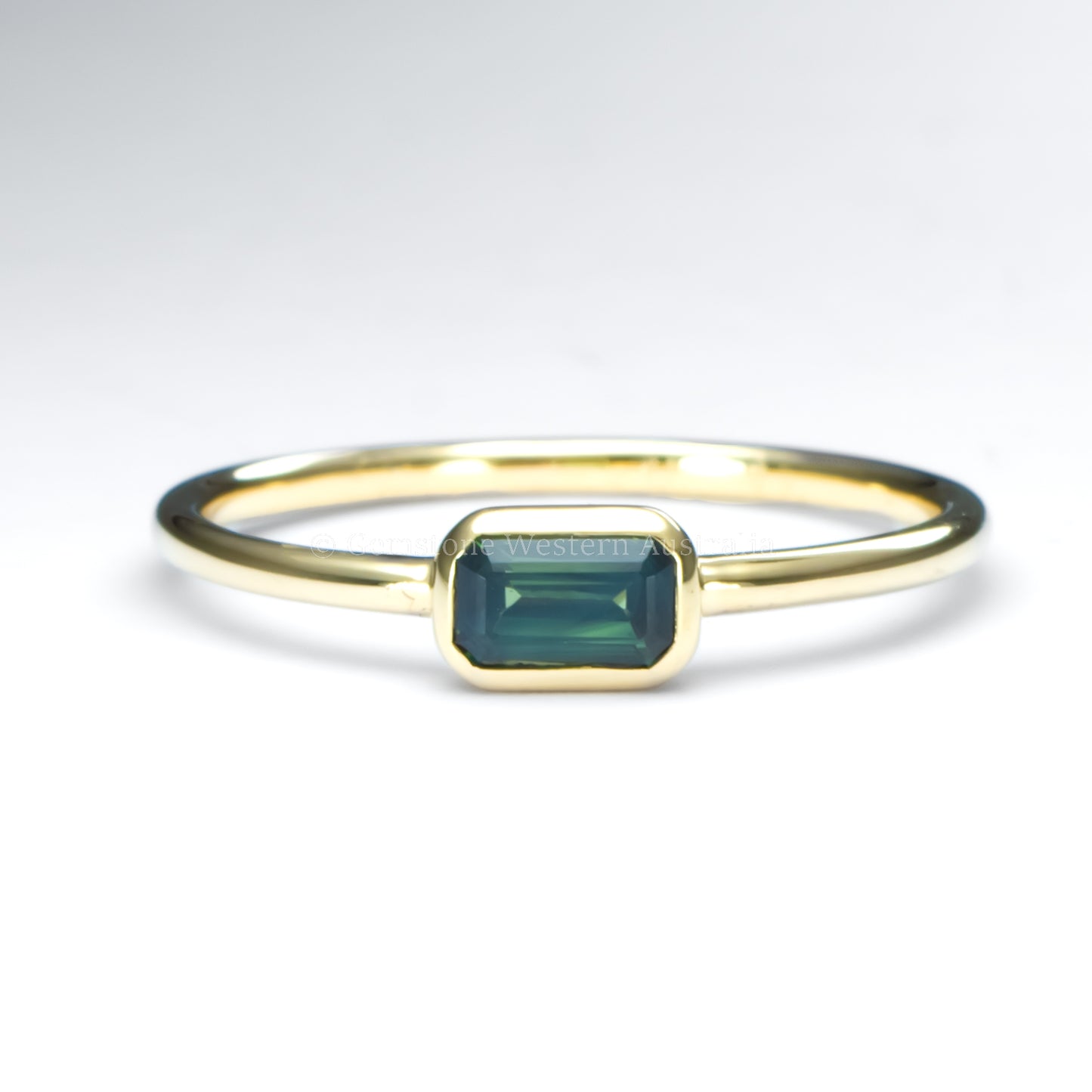 Dainty Solitaire Australian Teal Sapphire Ring – 9K Yellow or Rose Gold, Emerald Cut