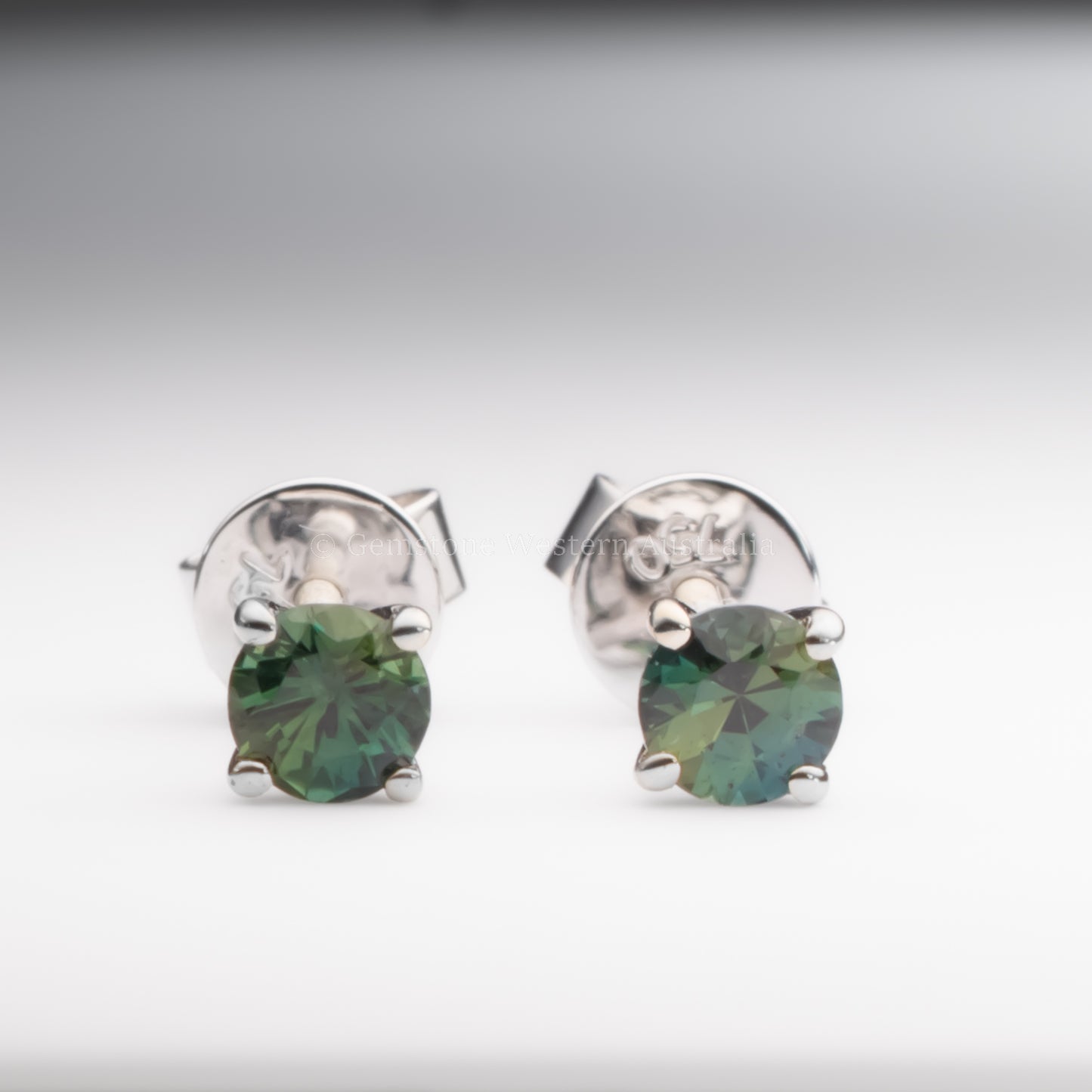 Australian teal sapphire stud earrings 18K white gold
