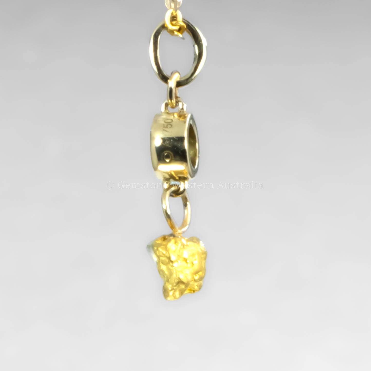 side view of sapphire pendant